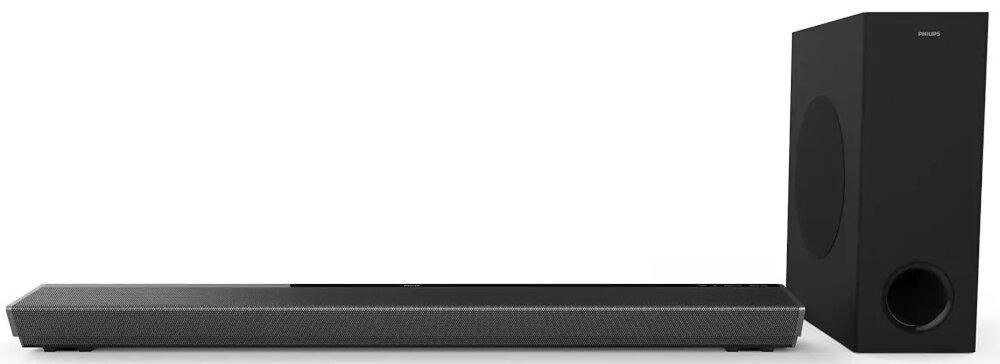 Na obrazie widoczny jest czarny soundbar oraz subwoofer. Na subwooferze znajduje się logo \'PHILIPS\'.