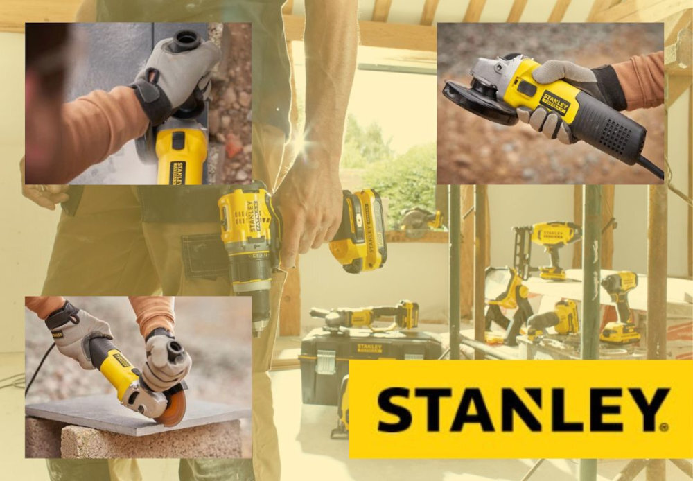 Na obrazie widoczna jest szlifierka kątowa marki Stanley, trzymana przez osobę w rękawicach roboczych. W tle znajdują się inne narzędzia oraz logo \'STANLEY\'.