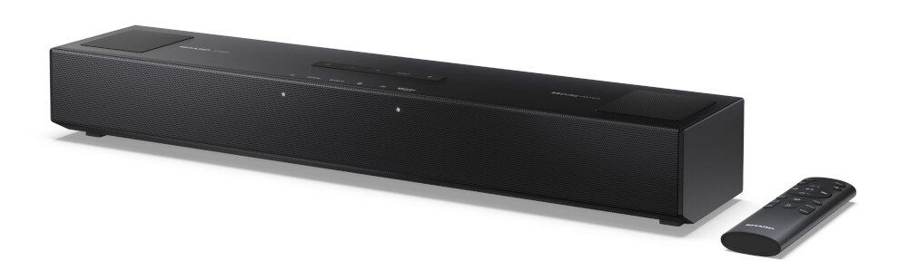 Czarny soundbar z widocznymi przyciskami na górnej powierzchni oraz pilotem obok. Na urządzeniu widoczne jest logo \'SHARP\'.