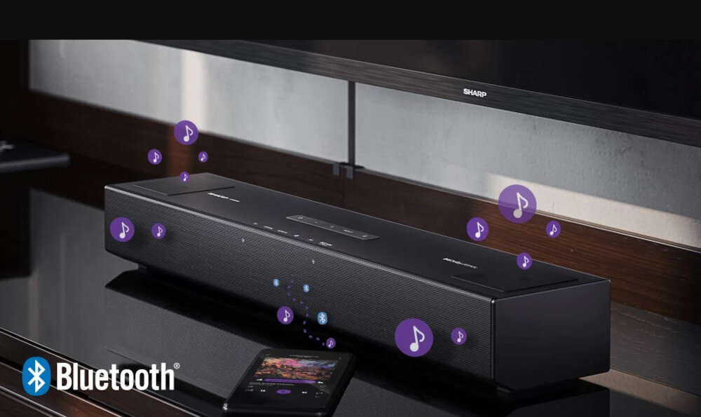 Na obrazie widoczny jest czarny soundbar z logo SHARP, umieszczony pod telewizorem. Wokół soundbara unoszą się fioletowe ikony nut, a w lewym dolnym rogu znajduje się logo Bluetooth.