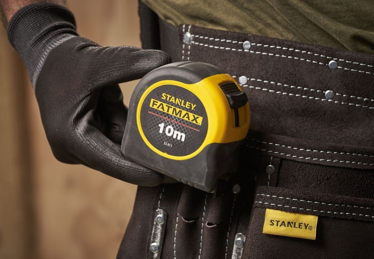 Miara zwijana STANLEY 0-33-811 (10 m), dokładność, klasa II, wstrząsy, solidność, miara przytwierdzona na spodni osoby