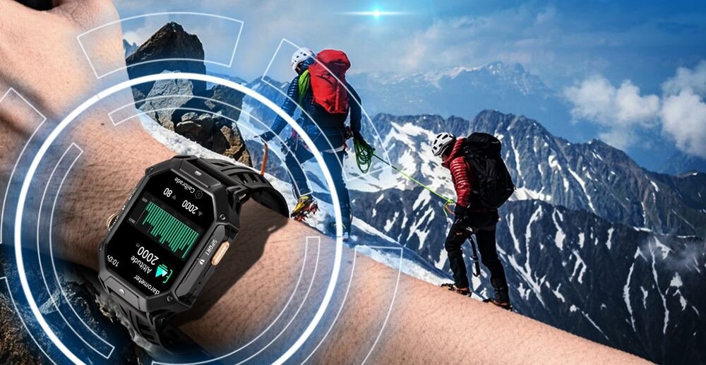 Na pierwszym planie widoczny jest czarny smartwatch z wyświetlaczem pokazującym dane, w tle widać górski krajobraz z osobami wspinającymi się po ośnieżonych szczytach.