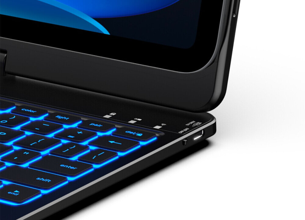 Obraz przedstawia czarną klawiaturę z niebieskim podświetleniem, przymocowaną do urządzenia przypominającego tablet. Widoczne są klawisze z oznaczeniami takimi jak \'enter\', \'shift\', \'end\', oraz przyciski funkcyjne na górze klawiatury.