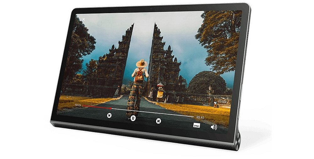 Tablet z wyświetlaczem pokazującym osobę stojącą przed dużą bramą w otoczeniu drzew. Na ekranie widoczne są przyciski odtwarzacza multimedialnego oraz pasek postępu z czasem 35:45.