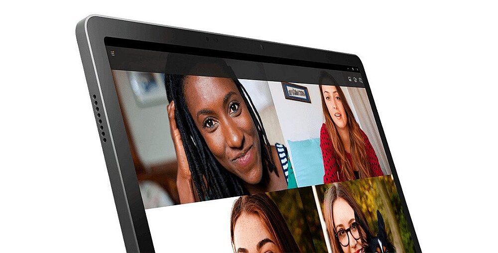 Tablet z wyświetlaczem pokazującym cztery osoby podczas wideorozmowy. Urządzenie ma szarą obudowę i wąskie ramki wokół ekranu.