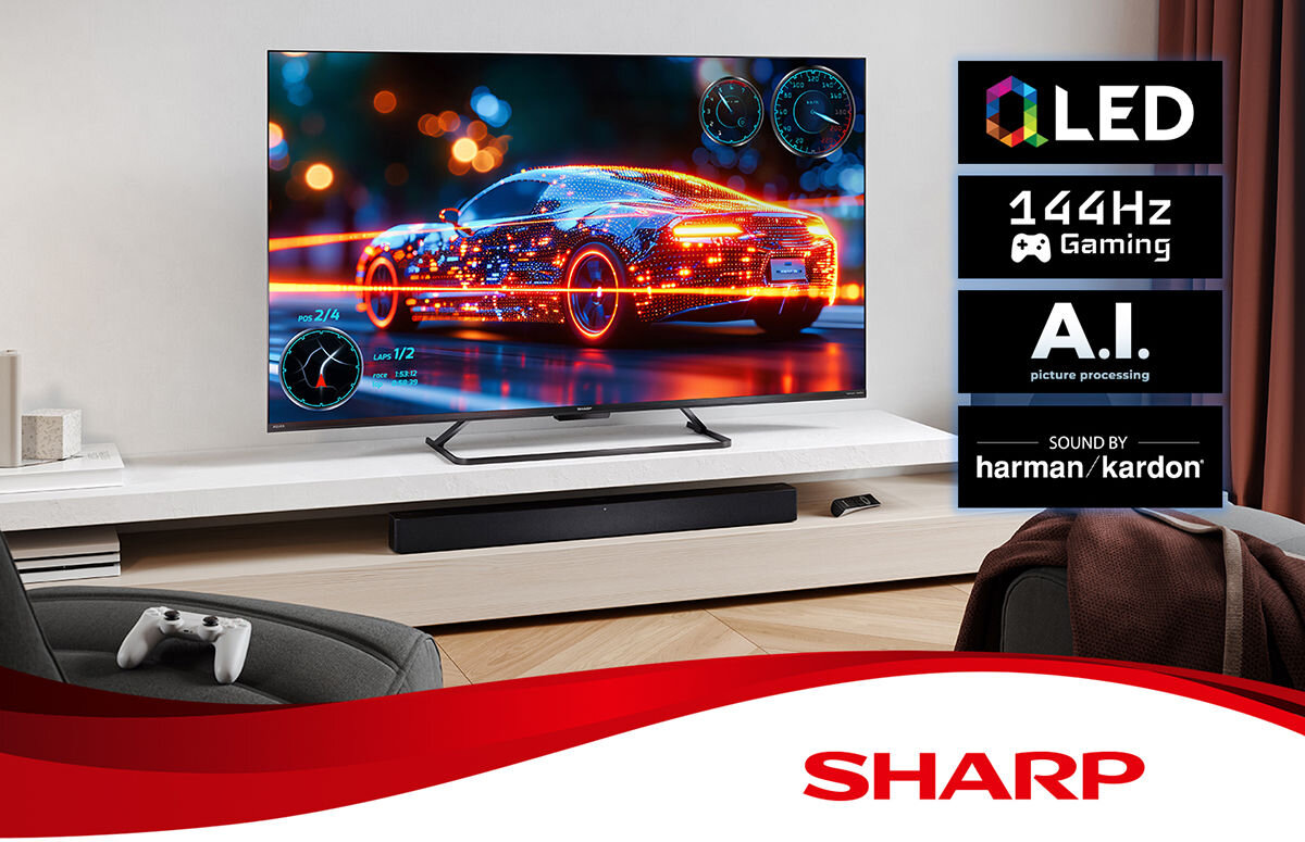 Telewizor wyświetla obraz samochodu z efektami świetlnymi, a obok znajdują się informacje: LED, 144Hz Gaming, A.I. picture processing, Sound by harman/kardon. Na dole widoczne jest logo SHARP na czerwonym tle.