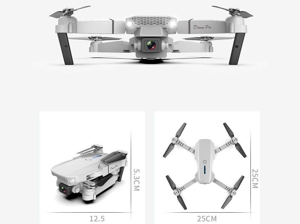 Obraz przedstawia drona z napisem \'Drone Pro\' na ramieniu, z widoczną kamerą z przodu. Dron jest pokazany w dwóch ujęciach: złożony o wymiarach 12.5 cm na 5.3 cm oraz rozłożony o wymiarach 25 cm na 25 cm.