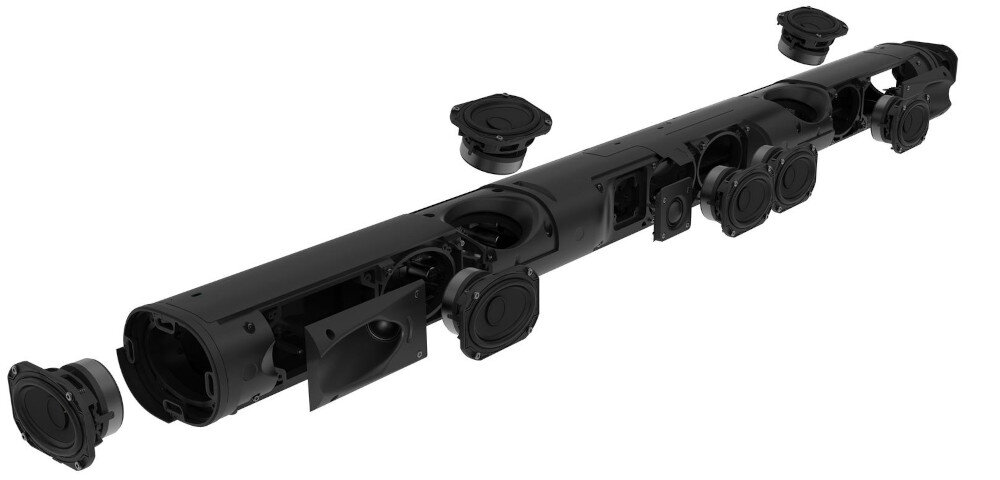 Obraz przedstawia rozłożony na części soundbar w kolorze czarnym, ukazujący wewnętrzne komponenty takie jak głośniki i obudowy. Widoczne są różne elementy konstrukcyjne rozmieszczone wzdłuż całej długości urządzenia.