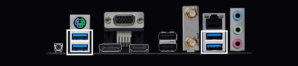 Obraz przedstawia panel złącz płyty głównej z różnymi portami, w tym USB, VGA, HDMI, audio oraz złączem sieciowym.