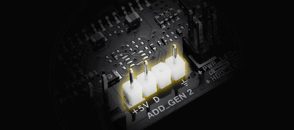 Zbliżenie na fragment płyty głównej z widocznymi pinami i oznaczeniami: \'+5V D\' oraz \'ADD_GEN 2\'.