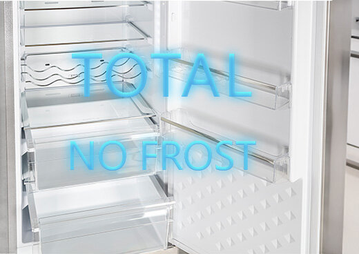 Zbliżenie na wnętrze lodówki MPM-311-FF-57. Napis: Total No Frost.