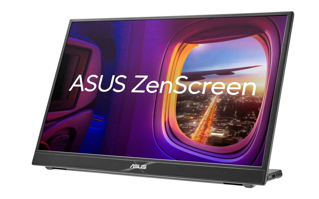 Monitor ASUS ZenScreen z wyświetlanym obrazem widoku z okna samolotu, na którym widać miasto nocą. Na ekranie widoczny jest napis \'ASUS ZenScreen\'.