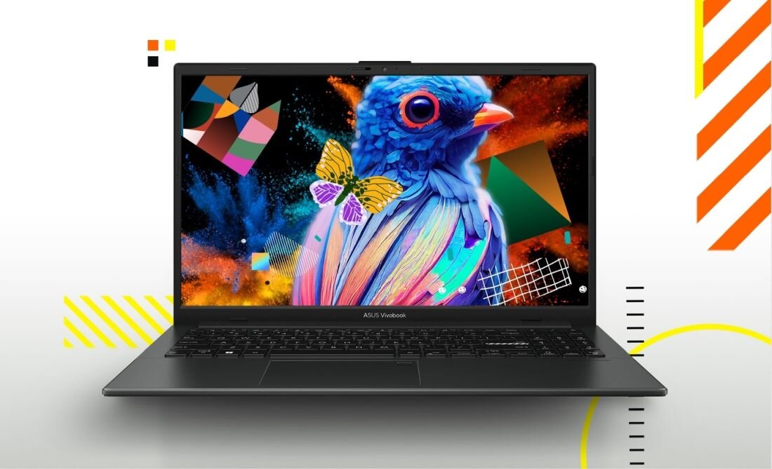 Laptop z wyświetlaczem pokazującym kolorową grafikę z ptakiem i motylem. Na obudowie widoczne jest logo \'ASUS VivoBook\'.