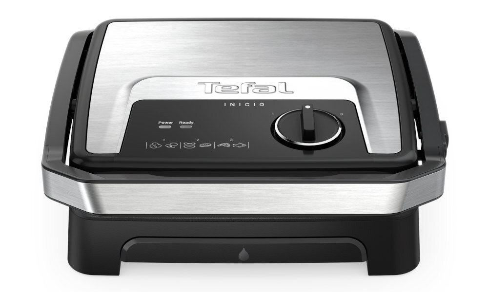 Grill elektryczny z metaliczną pokrywą i czarną podstawą, na której widnieje logo \'Tefal\' oraz napisy \'INICIO\', \'Power\', \'Ready\'.