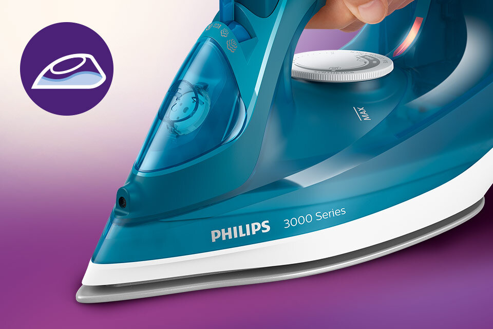 Na obrazie widoczne jest żelazko z napisem \'PHILIPS 3000 Series\' na tle gradientu fioletowo-białego. Obok znajduje się ikona przedstawiająca żelazko na fioletowym tle.