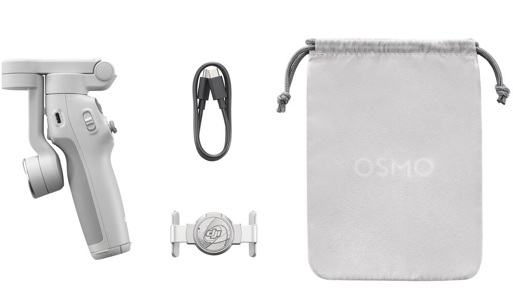 Na obrazie widoczny jest szary gimbal, kabel USB, uchwyt z logo DJI oraz szara torba z napisem \'OSMO\'.