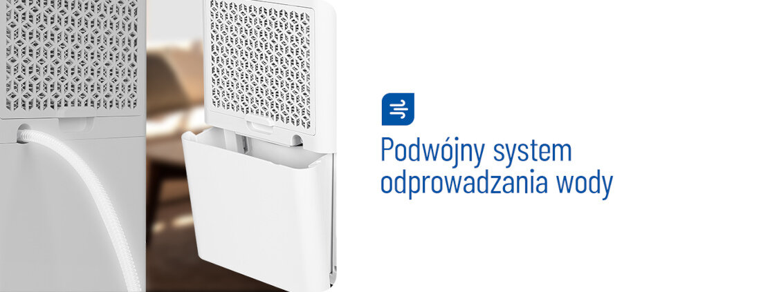 Obraz przedstawia biały osuszacz z otworem na wąż i pojemnikiem na wodę. Obok widoczny jest tekst: \'Podwójny system odprowadzania wody\'.
