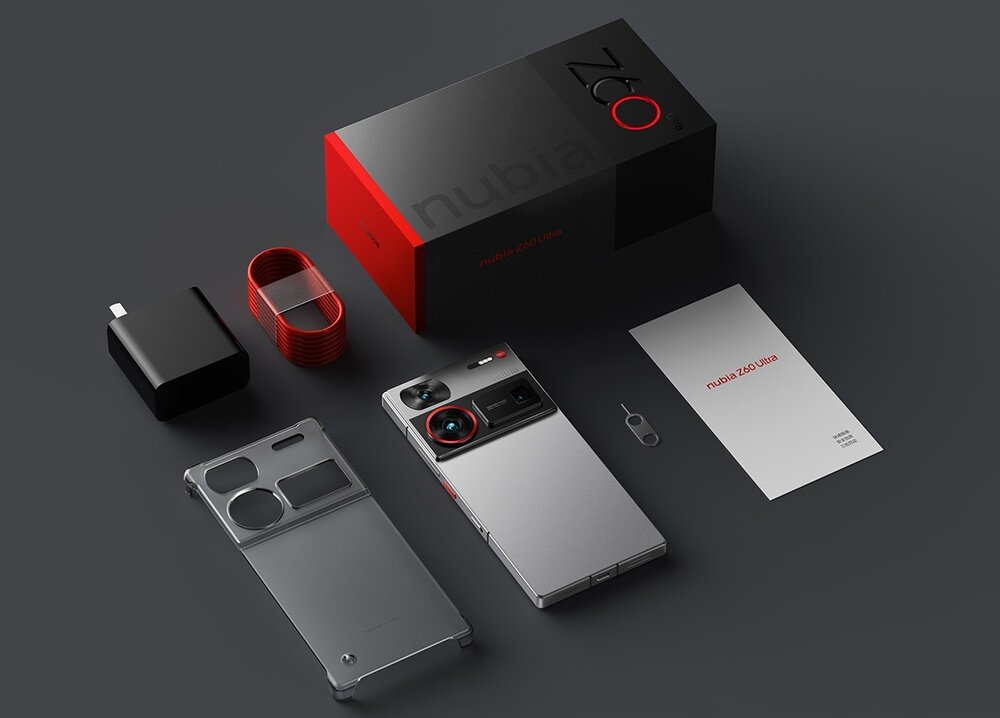 Na obrazie widoczny jest smartfon z dużym ekranem, obok którego znajduje się pudełko z napisem \'nubia Z60 Ultra\'. W zestawie znajdują się również ładowarka, kabel, etui, kluczyk do karty SIM oraz instrukcja z napisem \'NUBIA Z60 Ultra\'.