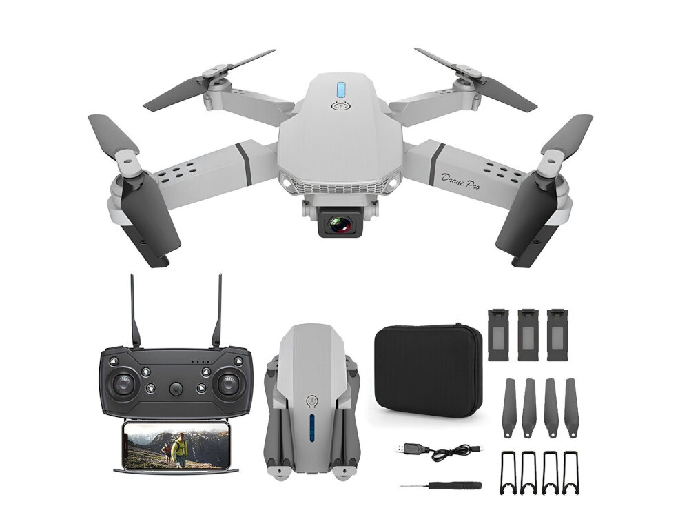 Na obrazie widoczny jest szary dron z rozłożonymi śmigłami, kontroler z ekranem, złożony dron, czarna torba, trzy baterie, cztery śmigła, kabel USB, śrubokręt i cztery osłony na śmigła. Na dronie znajduje się napis \'Drone Pro\'.