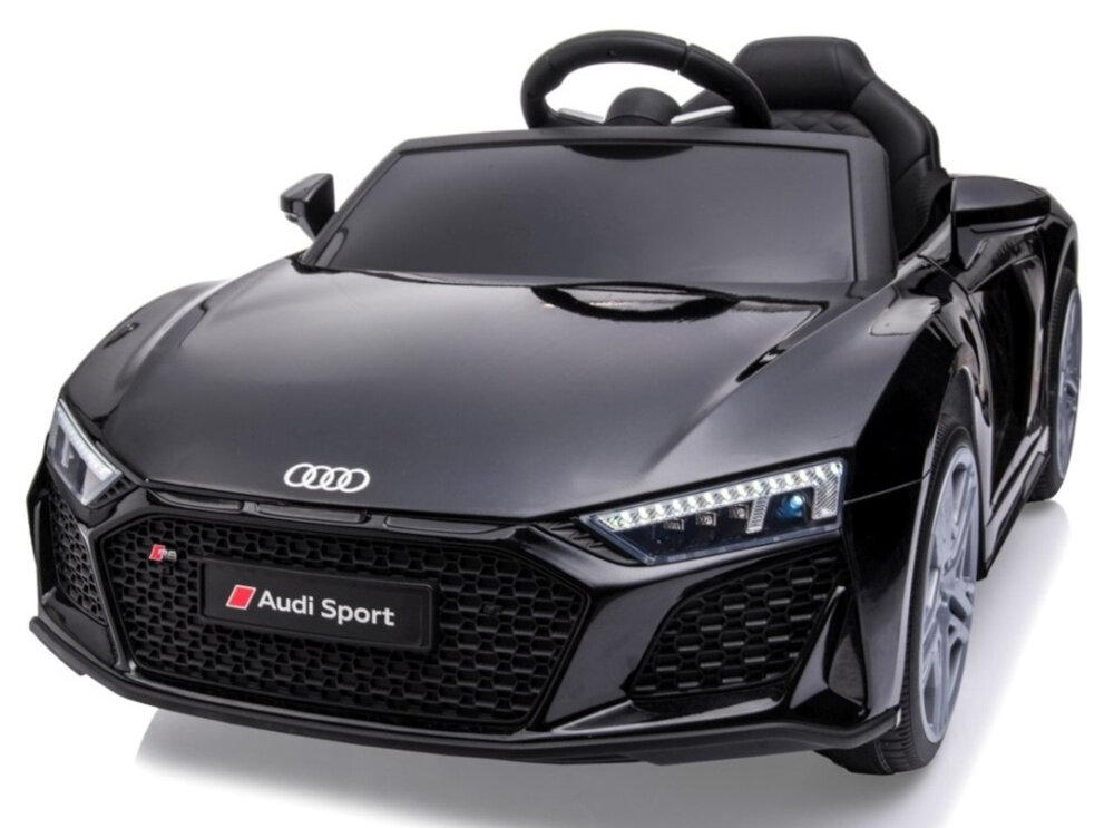 Czarny samochód dziecięcy stylizowany na Audi R8 Spyder z widocznym logo Audi na masce i napisem \'Audi Sport\' na tablicy rejestracyjnej.