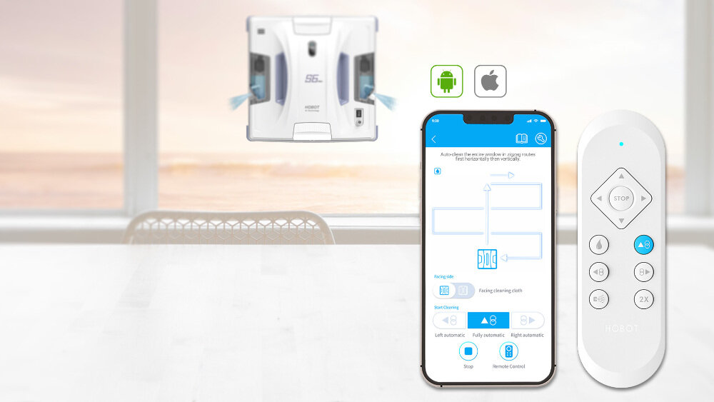 Na obrazie widoczny jest robot do mycia okien, smartfon z aplikacją oraz pilot zdalnego sterowania. W tle znajduje się duże okno z widokiem na zachód słońca.