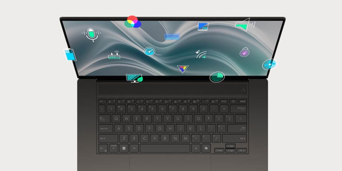 Obraz przedstawia laptop z otwartym ekranem, na którym widoczne są różne ikony symbolizujące funkcje i aplikacje. Klawiatura jest czarna, a ekran wyświetla abstrakcyjny wzór w tle.