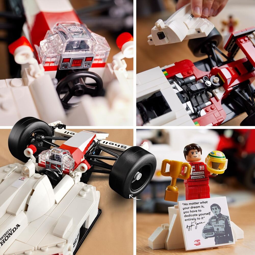 Na obrazie widoczny jest model samochodu wyścigowego z klocków LEGO z detalami wnętrza i zewnętrza, w tym kierownicą i elementami silnika. Obok znajduje się figurka z trofeum i kaskiem oraz tabliczka z cytatem: \'No matter what your dream is, you have to dedicate yourself entirely to it.\'