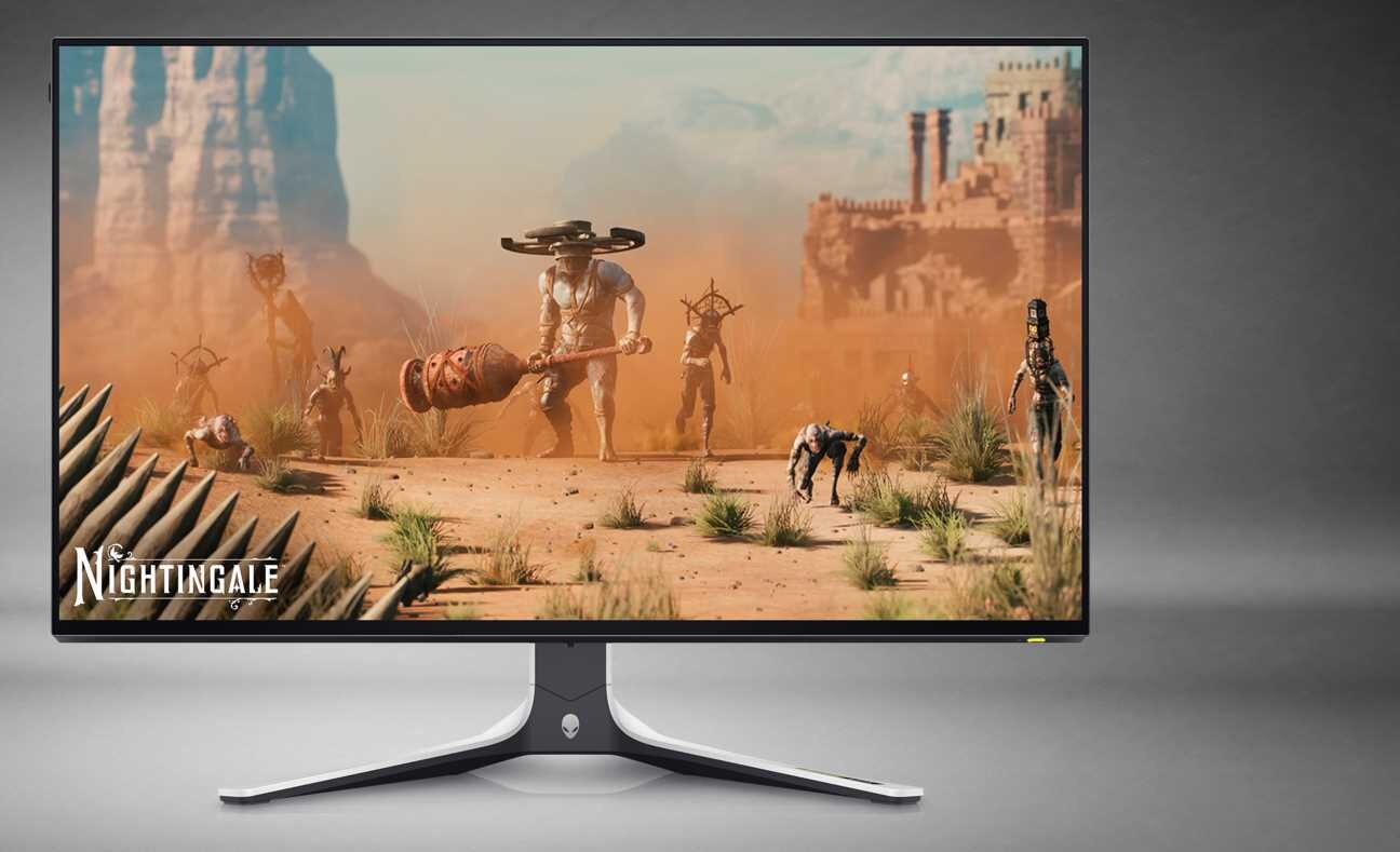 Monitor wyświetla scenę z gry z postaciami na pustynnym tle, z widocznym logo \'Nightingale\'. Monitor ma nowoczesną podstawę i cienkie ramki.