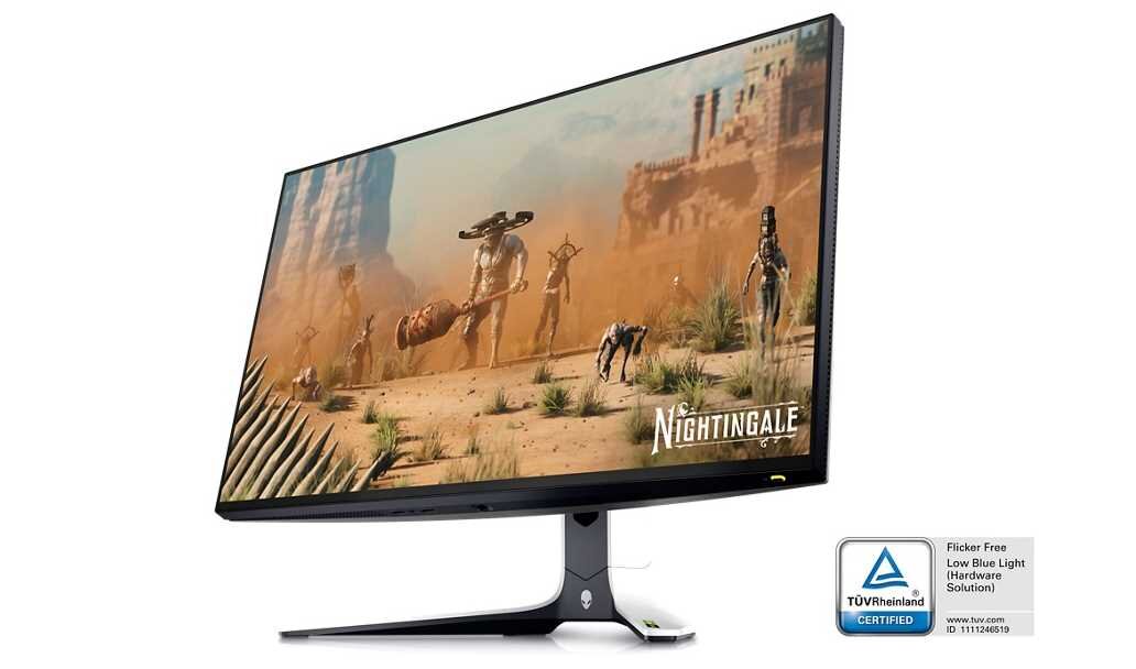 Monitor z wyświetlanym obrazem przedstawiającym postacie w pustynnym krajobrazie z napisem \'Nightingale\'. W prawym dolnym rogu znajduje się certyfikat TÜV Rheinland z informacją \'Flicker Free Low Blue Light Hardware Solution\'.