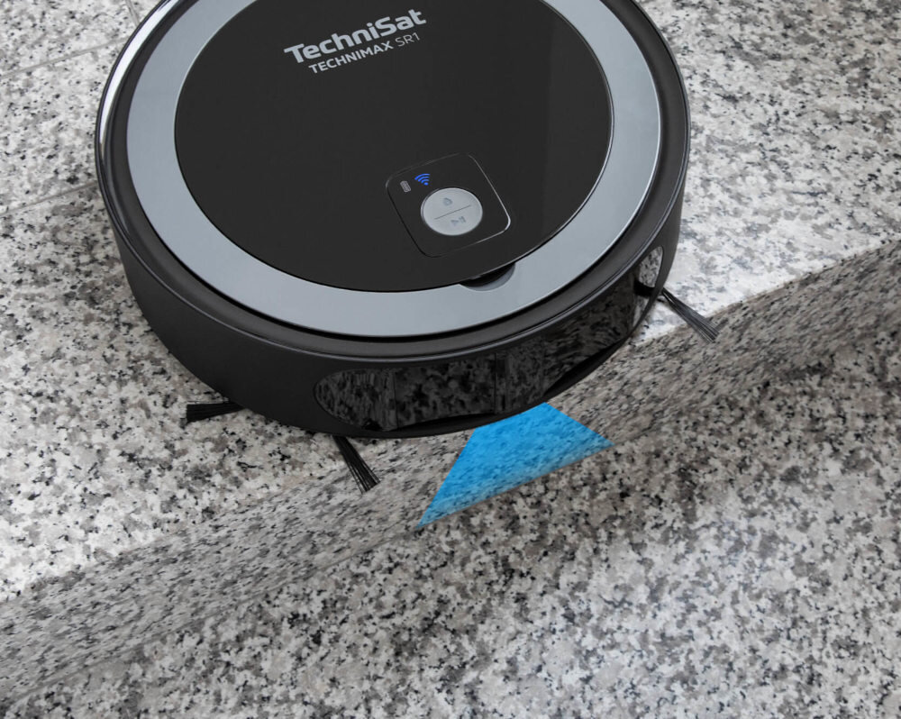 Robot sprzątający TECHNISAT SR1 na powierzchni przypominającej marmur, z widocznym logo \'TechniSat TECHNIMAX SR1\' na górze urządzenia.