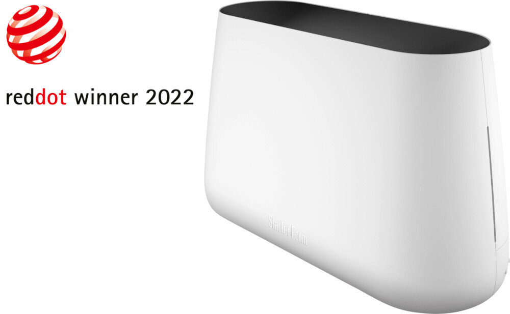 Biały nawilżacz ultradźwiękowy o nowoczesnym designie z czarnym wnętrzem. Obok widoczne jest logo \'reddot winner 2022\'.