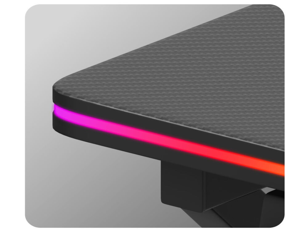 Fragment biurka z czarnym blatem o teksturowanej powierzchni i podświetleniem RGB w kolorach różowym i czerwonym.