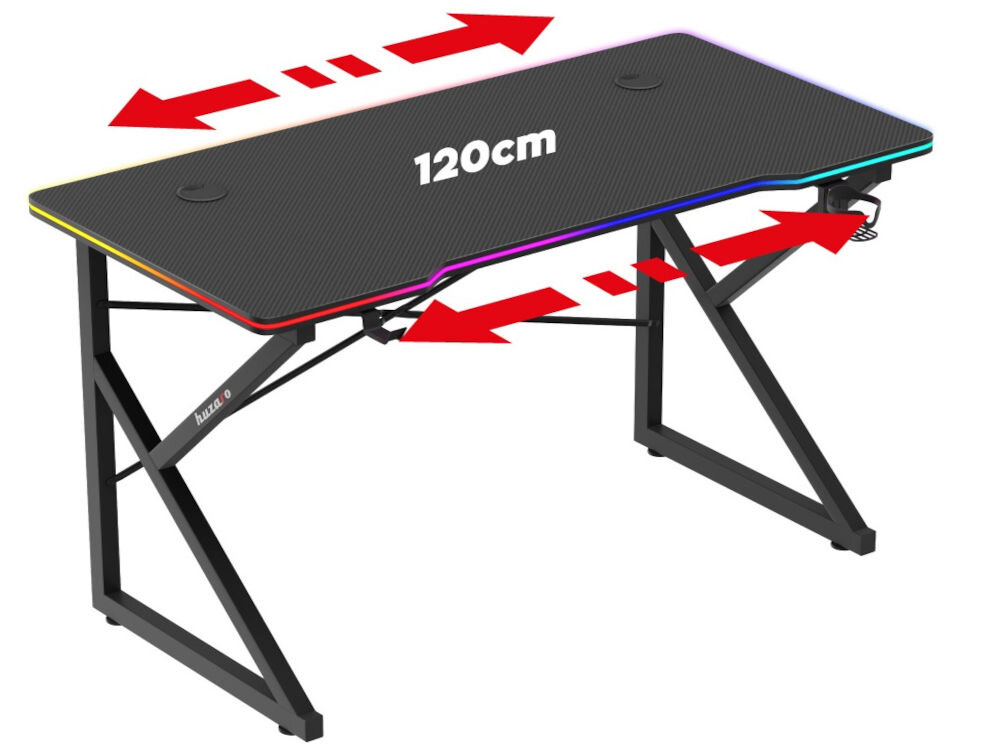 Czarne biurko gamingowe z kolorowym podświetleniem krawędzi i napisem \'120cm\' na blacie. Widoczne są czerwone strzałki wskazujące na różne kierunki oraz logo \'huzaro\' na stelażu.