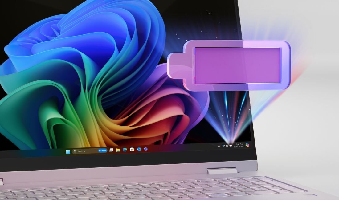 Laptop z otwartym ekranem wyświetlającym kolorową grafikę przypominającą kwiat. Obok ekranu widoczna jest ikona baterii w kolorze fioletowym.