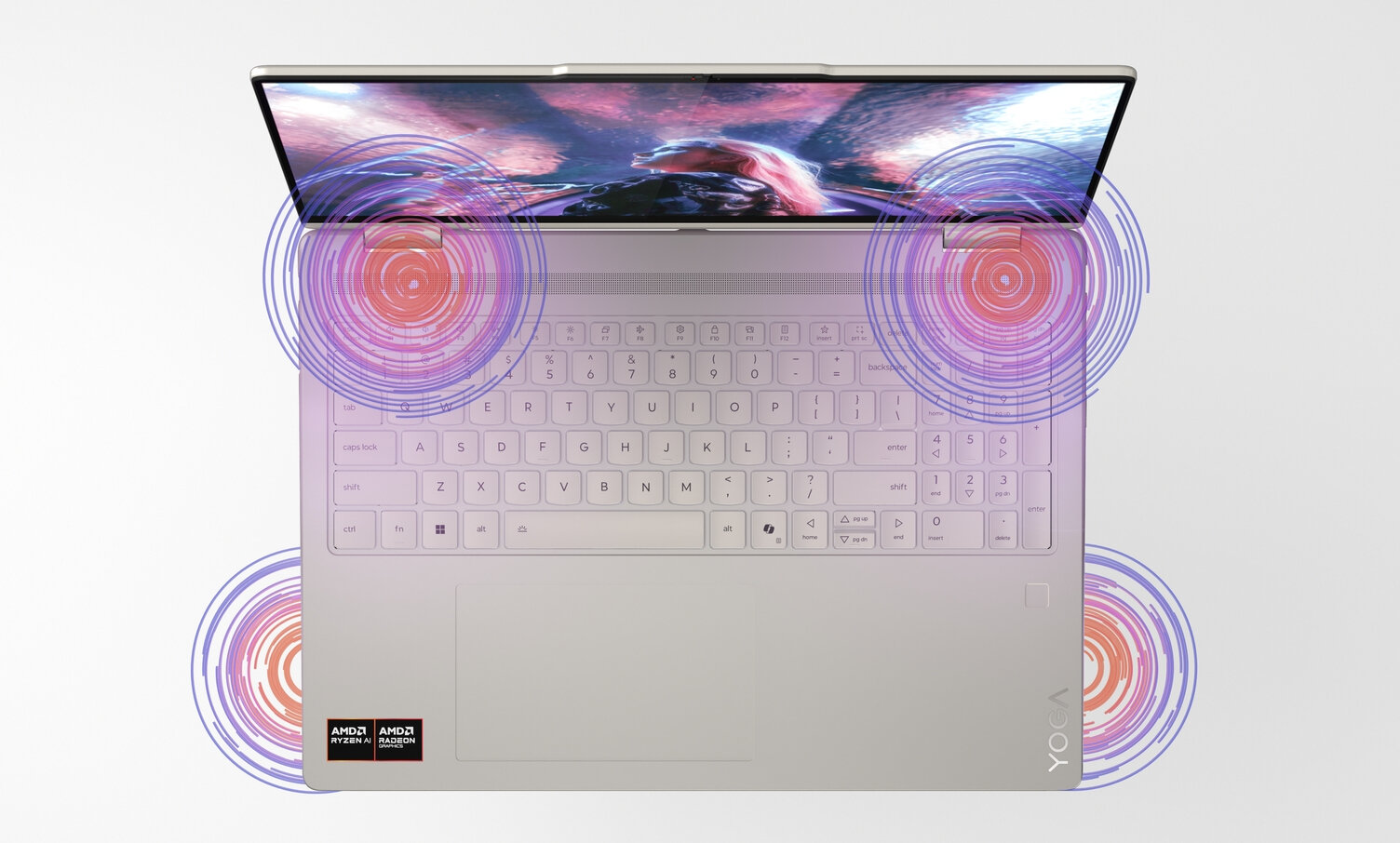 Laptop z otwartym ekranem, na klawiaturze widoczne są naklejki \'AMD Ryzen 7\' i \'AMD Radeon Graphics\'. Wokół laptopa widoczne są kolorowe fale dźwiękowe, a na ekranie wyświetlany jest dynamiczny obraz.
