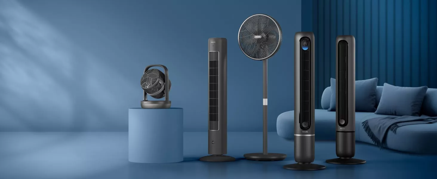 Na obrazie znajduje się pięć wentylatorów w ciemnoszarym kolorze, ustawionych na niebieskim tle. Na dwóch z nich widoczne jest logo \'PHILIPS\'.