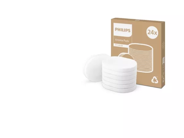 Na obrazie widoczne są białe krążki oraz pudełko z napisem \'PHILIPS Aroma Pads 24x\'.