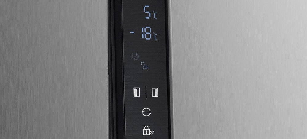 Panel sterowania lodówki z wyświetlaczem pokazującym temperatury 5°C i -18°C oraz ikonami symbolizującymi różne funkcje.