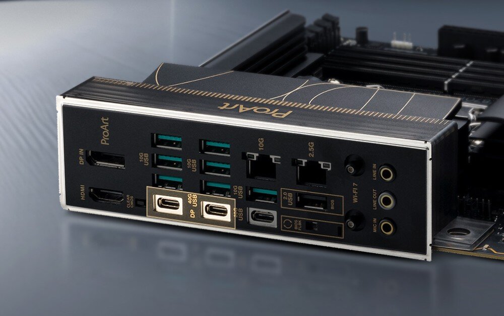Obraz przedstawia panel tylny płyty głównej z różnymi portami, w tym USB, HDMI, DP IN oraz gniazdami audio. Na panelu widoczny jest napis \'ProArt\'.
