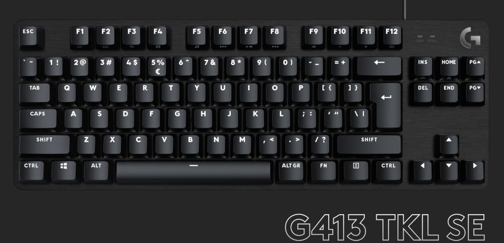 Czarna klawiatura mechaniczna z białymi oznaczeniami klawiszy, w tym klawisze funkcyjne od F1 do F12. W prawym dolnym rogu widoczny jest napis \'G413 TKL SE\'.
