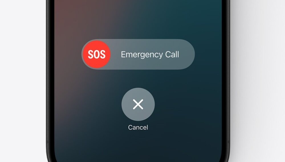 Ekran smartfona z widocznymi przyciskami \'SOS Emergency Call\' i \'Cancel\'.