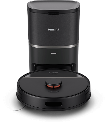 Na obrazie widoczny jest czarny robot sprzątający z okrągłą obudową oraz stacja dokująca. Na obu urządzeniach znajduje się logo \'PHILIPS\'.