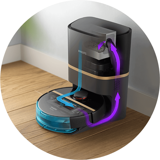Robot sprzątający PHILIPS Aqua 7000 XU7100/01 znajduje się przy stacji dokującej na drewnianej podłodze. Na urządzeniu widoczne są strzałki w kolorach niebieskim i fioletowym, wskazujące przepływ powietrza lub wody.