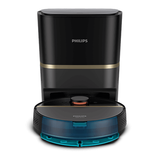 Na obrazie widoczny jest czarny robot sprzątający z niebieskim elementem z przodu, stojący przed stacją dokującą. Na obu urządzeniach znajduje się logo \'PHILIPS\'.