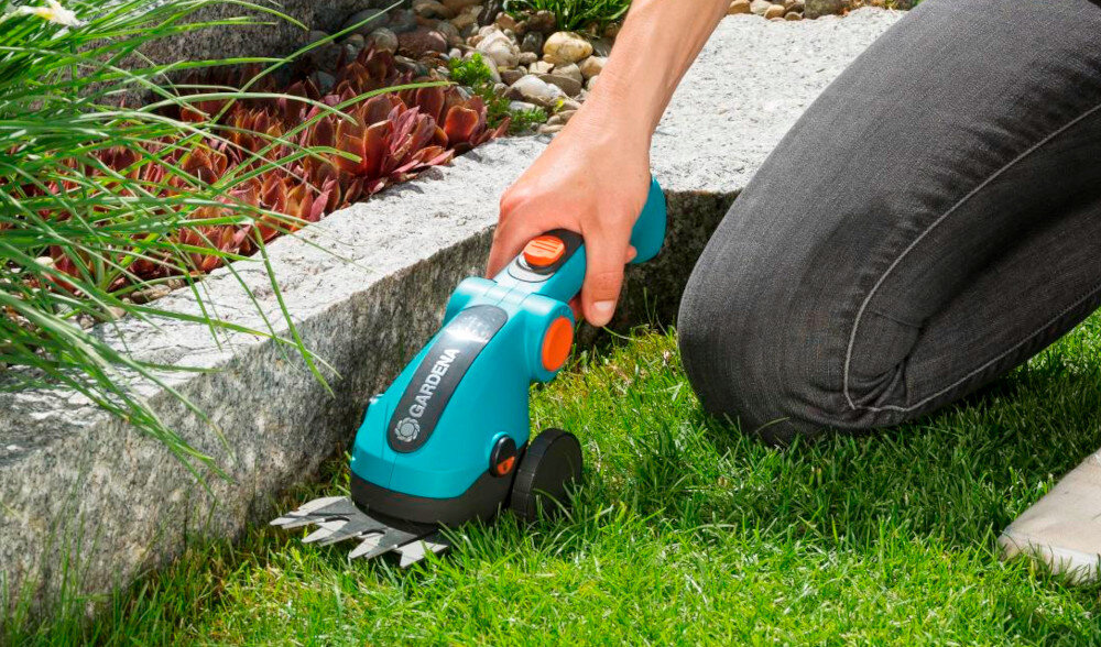 Nożyce do trawy GARDENA ComfortCut 9856-20 akumulatorowe wysokiej jakosci precyzyjnie oszlifowane ostrze antyadhezyjna powloka szerokosc robocza 8 cm optymalne ciecie bezpieczne uzytkowanie