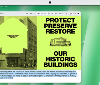 Na ekranie komputera widoczny jest dokument z tekstem: \'PROTECT PRESERVE RESTORE OUR HISTORIC BUILDINGS\'.