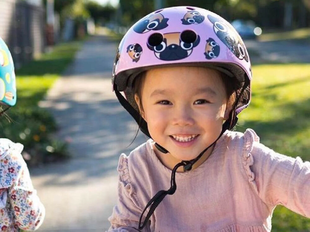 Kask HORNIT Pug Medium Różowy dla Dzieci (rozmiar S) normy bezpieczeńswa wesoły motyw