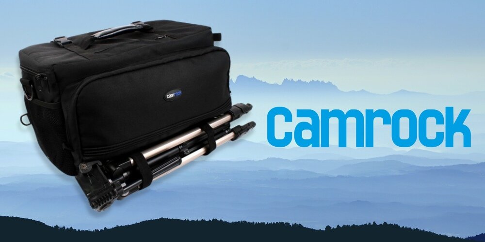 Torba fotograficzna Camrock Tank X60 z przymocowanym statywem, na tle górskiego krajobrazu i logotypu Camrock