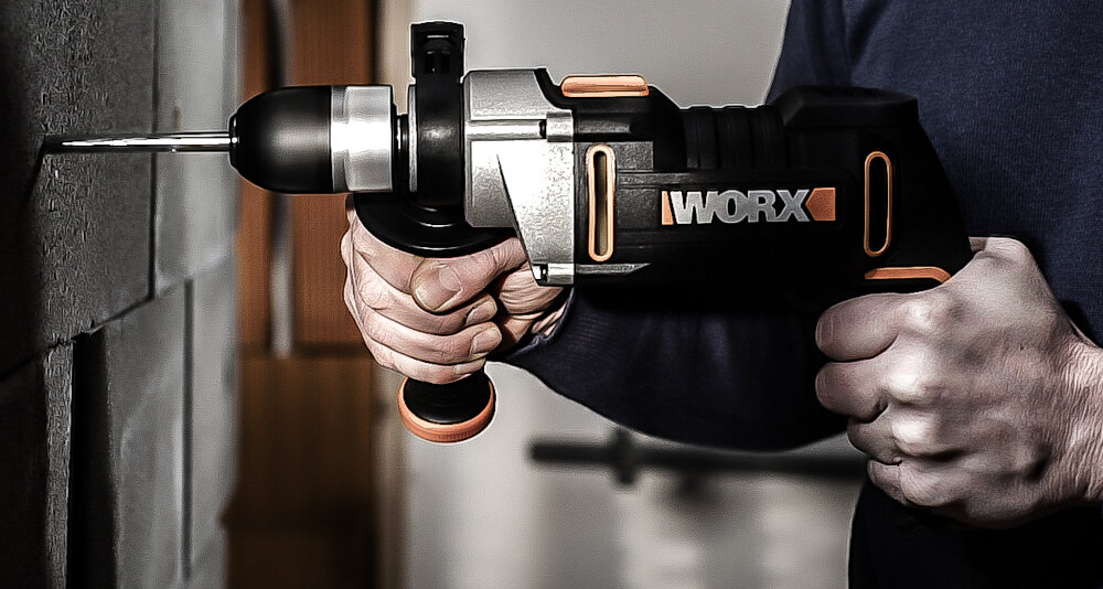 Wiertarka udarowa WORX WX318 solidny uchwyt kompaktowa konstrukcja do użytkowania w warunkach domowych w profesjonalnych i przemysłowych warsztatach ergonomiczna rękojeść główna regulowana rękojeść boczna okładzina antypoślizgowa