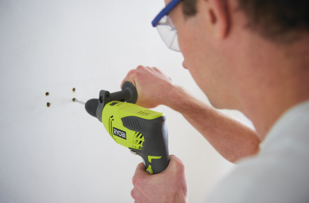 Wiertarka udarowa RYOBI RPD500-G silnik wydajny o mocy 500 W maksymalna prędkość obrotowa do 3000 obr/min liczba udarów 51000 łatwe wiercenie